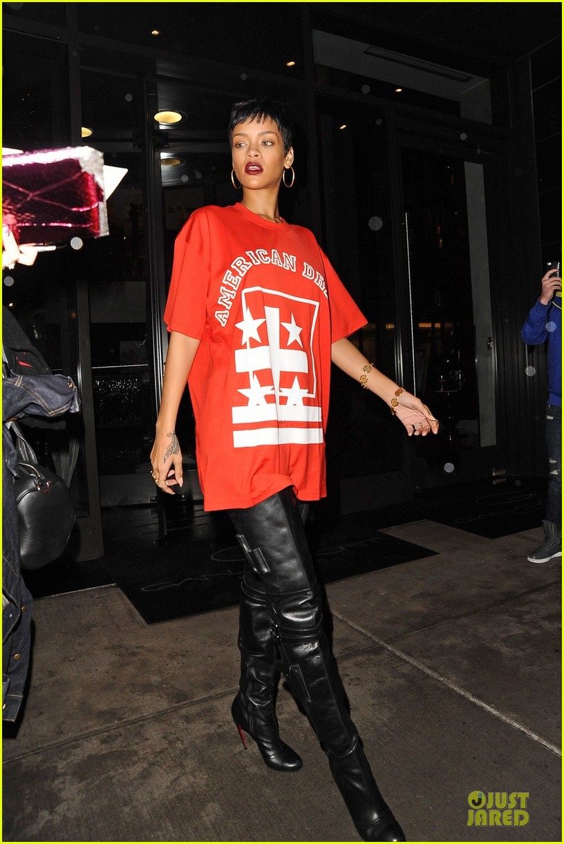 Rihanna, looking to be a little dazed, makes her way out of a recording studio to sign autographs and head back to her hotel in New York City